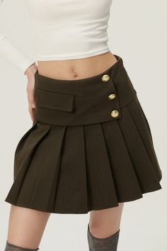 Shop Mila Gold Button Pleated Skort at storets. Buy Now Or Cry Later. Shop skirts, skorts, shorts, pants, jeans, leggings and more at storets. Style your look with the trendiest bottoms we have at storets. Shop Skirts, High Knee Socks Outfit, Womens Skorts, Trendy Bottoms, Sock Outfits, Jeans Leggings, Dark Brown Color, Shorts Pants, Pants Jeans