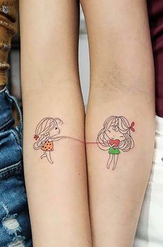 two girls with matching tattoos on their arms