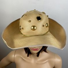 Beautiful hat by Oscar de la Renta! Pale straw with gold metal accents and gold braided trim 20.75" circumference around inner band 4" wide brim Condition: Needs to be steamed to be put back into its proper shape. A dozen bits of straw are sticking out on the underside of brim, all can be seen in close-up photos! Metal Accents, Beautiful Hats, Wide Brimmed Hats, Close Up Photos, Brim Hat, Metallic Accents, Wide Brimmed, Sun Hats, Caps Hats