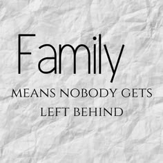 the words family mean's nobody gets left behind written on crumpled paper with black ink