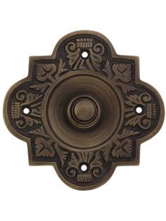 an antique style door knob with decorative designs