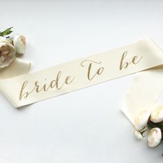 Bride To Be Bridal Sash  Ivory with Gold by ShadesOfPinkBtq Purple Sash, Sash Bachelorette, Bridal Shower Sash, Bachelorette Party Accessories, Bridal Shower Gifts For Bride, Bachelorette Sash, Bride To Be Sash, Bachelorette Party Bride