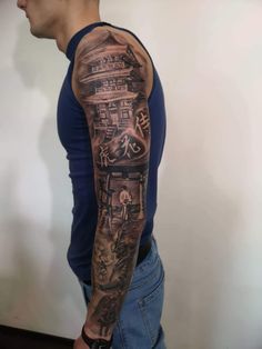 a man with a tattoo on his arm