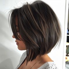 Chic Inverted Bob with Understated Layers Bob Haircuts For Thinning Hair For Women, A Line Bob For Thick Hair, Tapered Angled Bob, Layered Lob Haircut For Fine Hair, Inverted Bob Hairstyles With Layers, Inverted Bob Layered, Shoulder Length Inverted Bob With Layers, Short Bob Dark Hair With Highlights, Short Hairstyle Women Inverted Bob