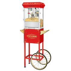 an old fashioned popcorn machine on wheels