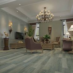 a living room filled with furniture and a chandelier