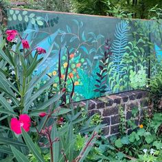 a garden with flowers and plants painted on it