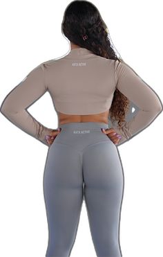 Versatile High Stretch Tops With Thumbholes, Fitted Casual Long Sleeve Workout Top, Casual Fitted Long Sleeve Workout Top, Fitted Long Sleeve Sporty Top, Fitted Long Sleeve Casual Top For Workout, Stretch Workout Tops For Fall, Stretch Tops For Fall Workouts, Stretch Tops For Workout In Fall, Trendy Long Sleeve Sports Top