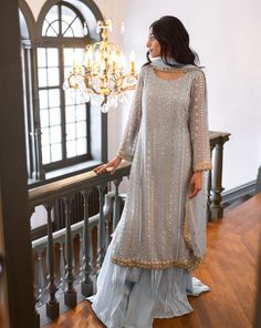 Please note the following before ordering: As this is a light pastel color, it may appear slightly sheer and a nude camisole can be worn underneath for those seeking extra coverage. 3 piece suit comes with sharara pants and dupatta Shirt length: 49 inches Sharara length: 47 inches This is a longer sharara that is meant to drag on the floor The shirt and dupatta are made of chiffon and the sharara is made of crushed material We do not offer returns or exchanges on this item. We cannot make any ex Sharara Suit Pastel Colors, Long Shirt With Sharara Weddings, Long Sharara Suits, Long Shirt With Crushed Sharara, Sharara Designs Pakistani Dresses, Blue Sharara Outfit, Long Shirt With Sharara, Light Blue Sharara, Pastel Color Clothes