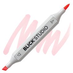 a red marker with the words black studio written on it in white and pink ink