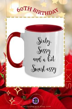 a red and white coffee mug with the words sixty sasy and a bit sweet assy on it