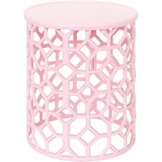 a pink side table with an intricate design