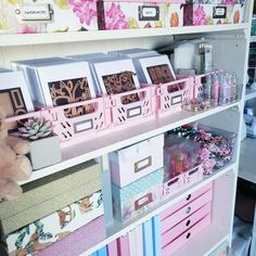 the shelves are filled with lots of crafting supplies