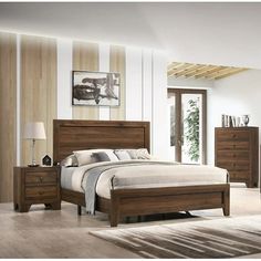 a bedroom scene with focus on the bed and dresser