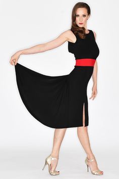 Tango dress features a perfect down the knee length with a slit and a contrastive black and red look. Flow skirt will add movement to your tango.  #tangodress #tangodresses #tangofashion #tangoclothes #tangoclothing Dance Crop Tops, Skating Dress, Dance Skirt, Ballroom Dress