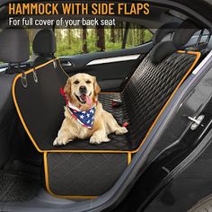 a dog sitting in the back seat of a car with an american flag bandanna