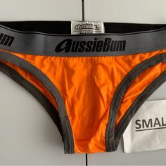 Aussie Bum Low Rise Brief Underwear, Color Orange W/Gray Waistband And Trim, Brand New, No Tags. Super Sexy Low Rise Brief Style, Soft Modal Fabric Is Stretchy And Hugs Your Curves And Bulge. Fitted Cotton Boxer Briefs For Training, Fitted Letter Print Boxer Briefs For Summer, Summer Fitted Boxer Briefs With Letter Print, Stretch Cotton Boxer Briefs With Letter Print, Cotton Sports Briefs, Casual Moisture-wicking Boxer Briefs, Compressive Moisture-wicking Solid Boxer Briefs, Summer Sports Micro-elastic Boxer Briefs, Cheap Solid Color Micro-elastic Boxer Briefs