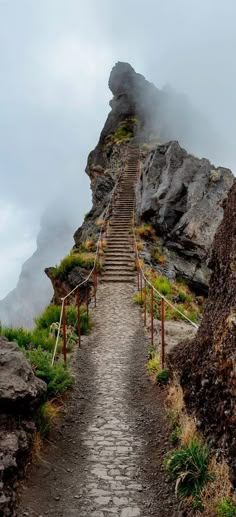 stairs leading up to the top of a mountain