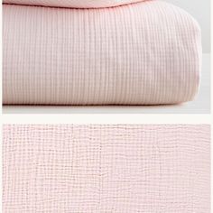 the pink sheets and pillow cases are folded up on top of each other in different positions