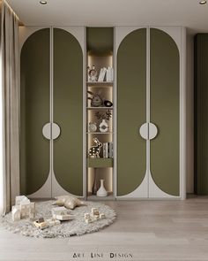 a living room with green walls and white furniture on the floor, along with bookshelves