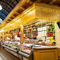 the inside of a grocery store filled with lots of food