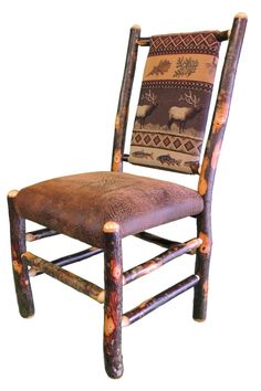 a chair made out of wood with an animal design on the back and seat cushion