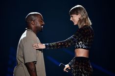 taylor swift and seal performing on stage at the 2013 american music awards