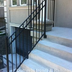 the stairs lead up to an apartment building