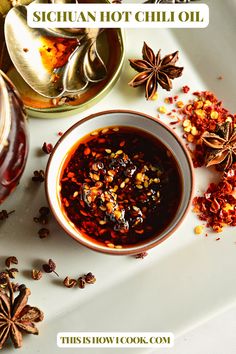 an assortment of spices and spice in bowls on a white surface with text overlay