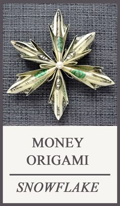 money origami snowflake brooch with the words money origami on it