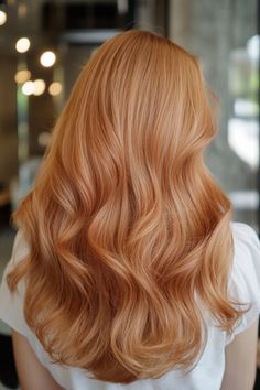 Person with long, wavy, auburn hair seen from the back. Pale Skin Strawberry Blonde Hair, Strawberry Blonde Bobs, Strawberry Blonde With Copper Lowlights, Blonde With Ginger, Strawberry Blonde Hair Pale Skin, Natural Red Hair Ideas, Bleach Blonde Hair With Dark Roots, Strawberry Copper Hair, Golden Strawberry Blonde Hair