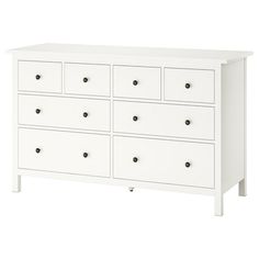 a white dresser with six drawers and two doors on each side, in front of a white background