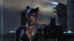 two female batman characters standing next to each other