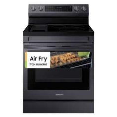 a black oven with an air fry sticker on the front and side door open