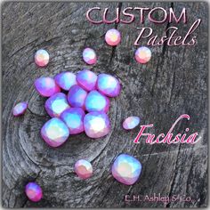 the words custom pastels are in front of an image of pink and blue rocks