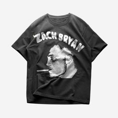 a black t - shirt with the words zach brown on it and an image of a