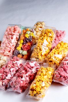 many different types of popcorn in plastic bags