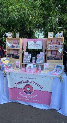 there are many books on display at the table for everyone to read or sell them