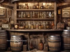 an old fashioned bar with lots of bottles on the shelves and wooden barrels behind it