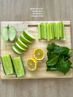 a cutting board topped with sliced up vegetables