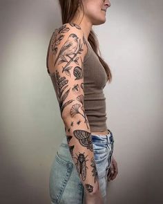 a woman with a tattoo on her arm