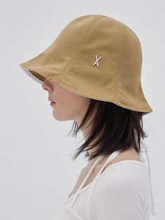 VARZAR is a total fashion brand that pursues pure reinterpretation and various attempts rather than trying to combine with certain cultures through various total fashions.- Minimal mood tulip bucket hat- VA stud point on the side- Great to wear all year around- 100% premium cotton used bucket hat Khaki Bucket Hat For Spring, Khaki Visor Hat For Spring, Khaki Wide Brim Bucket Hat For Spring, Beige Bucket Hat With Curved Brim, Everyday Beige Brimmed Bucket Hat, Trendy Beige Sun Hat For Everyday Wear, Trendy Beige Sun Hat For Everyday, Beige Trendy Everyday Sun Hat, Trendy Everyday Beige Sun Hat