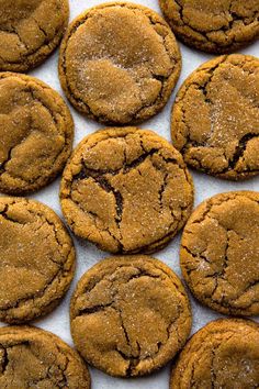 chocolate chip cookies are arranged on a sheet of paper