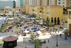 an aerial view of a city with lots of buildings