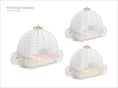 three white beds sitting next to each other on top of a bed in a cage