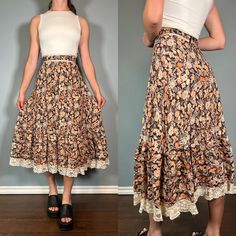 Stunning 70s brown floral prairie skirt with lace trim!  Size Small Brand - Lori Ann / Union Made Era - 70s Great Vintage Condition (FLAW - some very minor fraying on the lace) Made in Canada Measurements LAYING FLAT Waist - 12.5" Hips - 21" Length - 31" Please let me know if you have any questions! Vintage Brown Tiered Skirt, Brown Vintage Tiered Skirt, Vintage Brown Skirted Bottoms, Vintage Brown Flowy Skirt, Vintage Floral Print Tiered Skirt, Vintage Cotton Brown Skirt, Vintage Long Skirt With Lace Trim, Vintage Tiered Skirt With Floral Print, Vintage Lace Trim Skirt For Summer