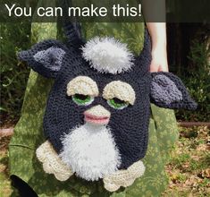 a crocheted mask is being held by a woman's hand with the caption you can make this