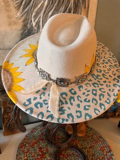 Teal Leopard Print With Sunflower and is on a Beige Suede Cowboy Hat Hand Burned With Silver Plated Hat Band. - Etsy Teal Leopard Print, Cowboy Hat Design, Hat Burning, Fascinator Hats Diy, Cowboy Hat Bands, Hat Bands, Hand Burn, Painted Hats, Diy Hat