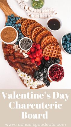 valentine's day charcuterie board with berries, raspberries and chocolate