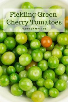 pickling green cherry tomatoes in a bowl with text overlay reading picking green cherry tomatoes